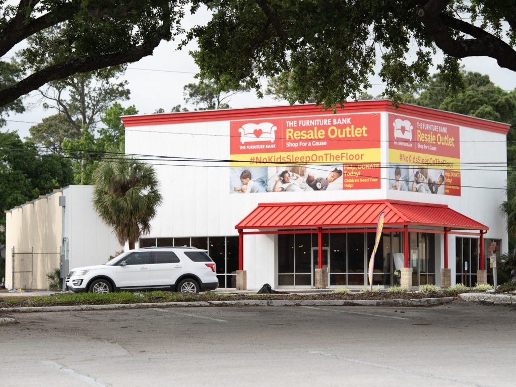 Exterior or showroom of The Furniture Bank Champions Outlet
